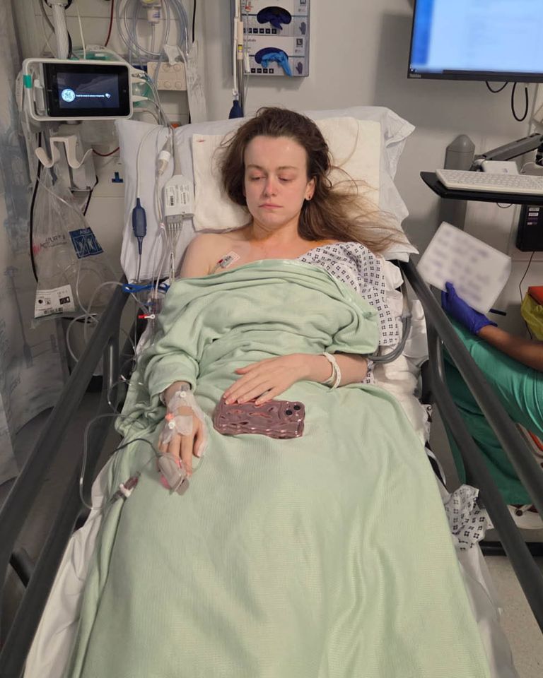 Sophie Martin, in hospital. A woman who thought her loss of hearing was due to playing loud music was shocked to find out it was a symptom of a rare genetic brain tumour. Sophie Martin, 29, noticed her earphones getting quieter but didn’t think much of it until she started to develop tinnitus. In June 2025, five months after her symptoms started, Sophie, from the Lake District, Cumbria, went to see her GP who referred her for a CT scan, which showed a mass on her brain. To her horror, Sophie was diagnosed with neurofibromatosis type 2 (NF2)