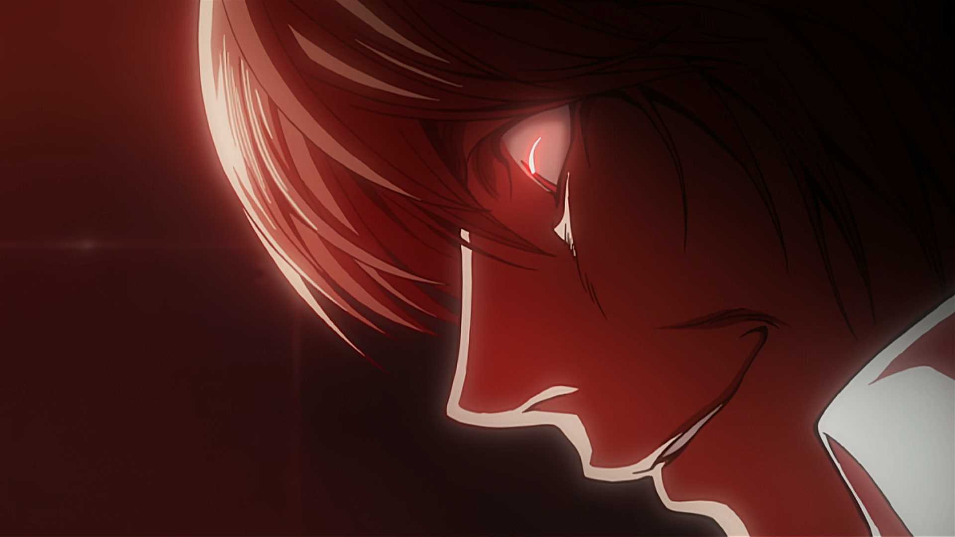 Light Yagami smiling as L dies in Death Note anime