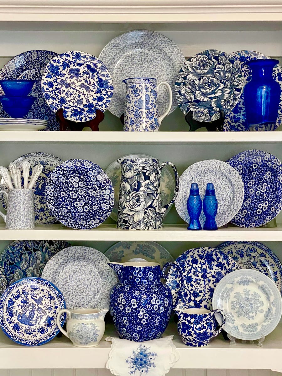 addicted-to-china-blue-plates-in-cabinet.jpeg