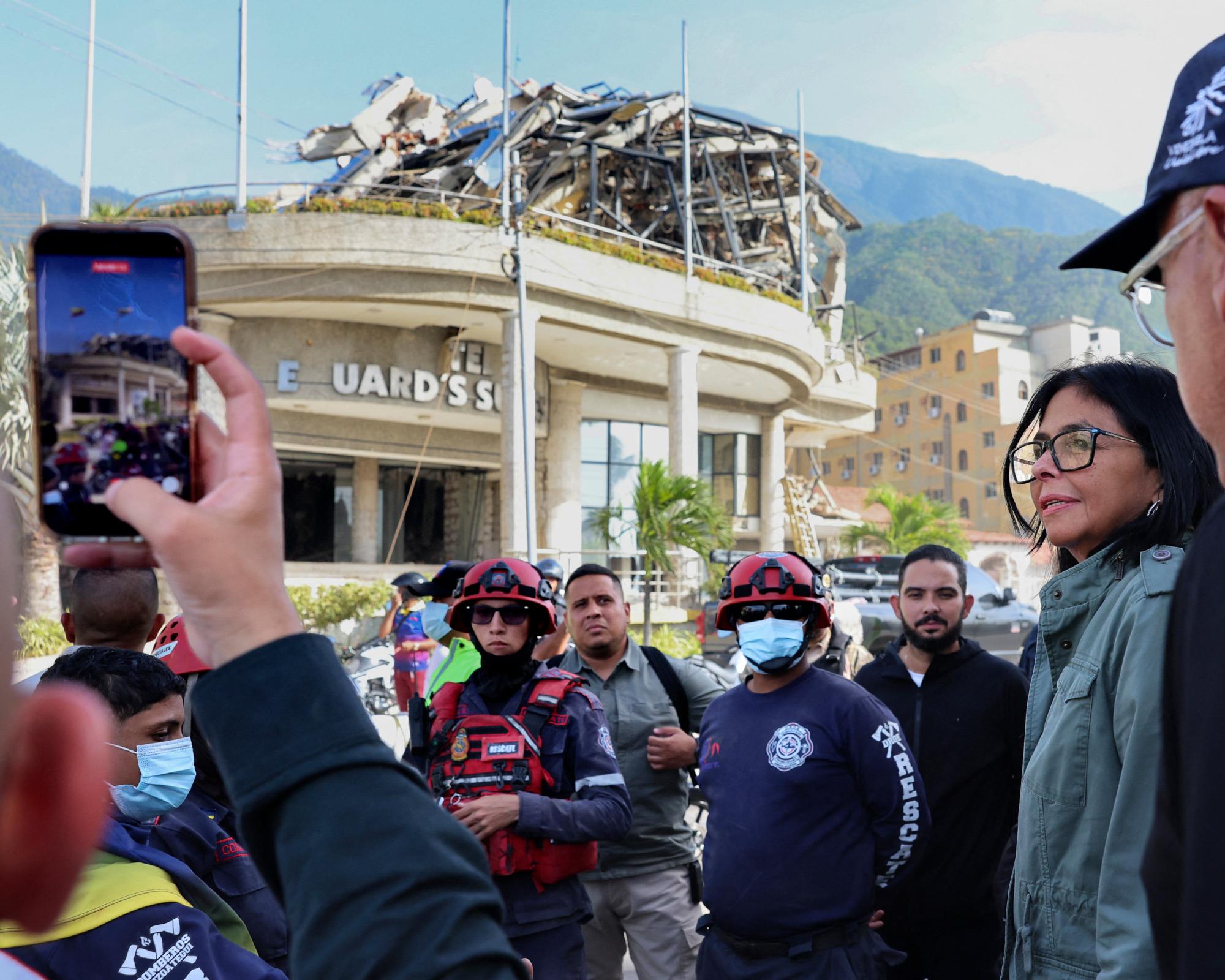 Delcy Rodríguez (right) tours the damage to the Caribbean coastal city of La Guaira, where the most damage was inflicted by twin earthquakes that struck Venezuela on 24 June. Photograph: Venezuelan presidency/AFP/Getty