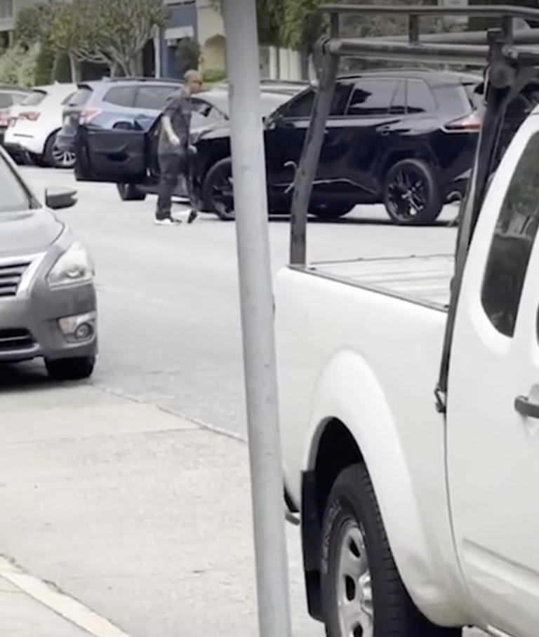 Angry man seen dangling off the side of car in San Francisco road rage ...