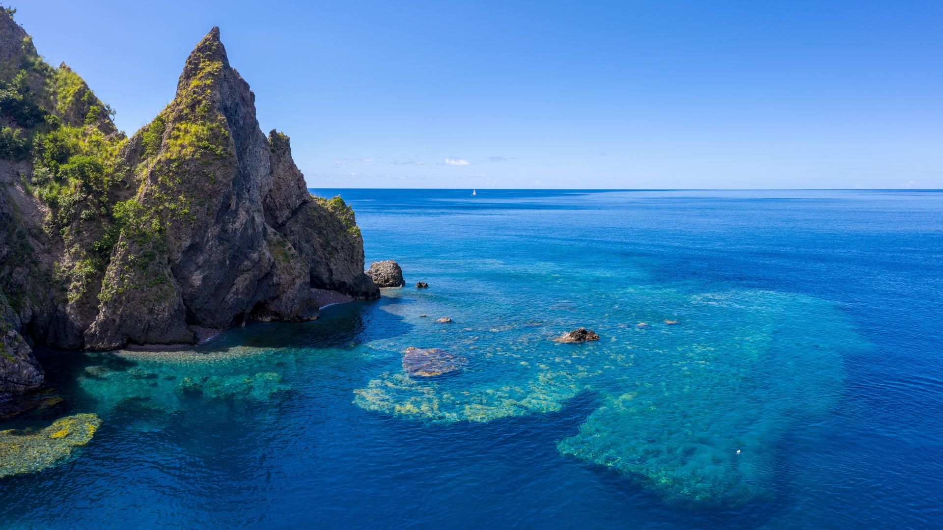 In the Caribbean, this volcanic island with black-sand beaches is one ...