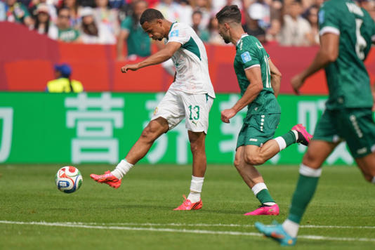 Senegal's Iliman Ndiaye (13) kicks the ball to score their fifth goal during the World Cup Group I soccer match between Senegal and Iraq in Toronto, Friday, June 26, 2026. (AP Photo/Stephanie Scarbrough)
