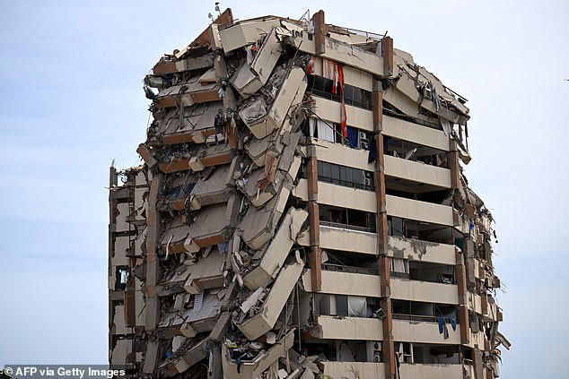 A view shows a heavily damaged apartment building following an earthquake in Catia La Mar, La Guaira state