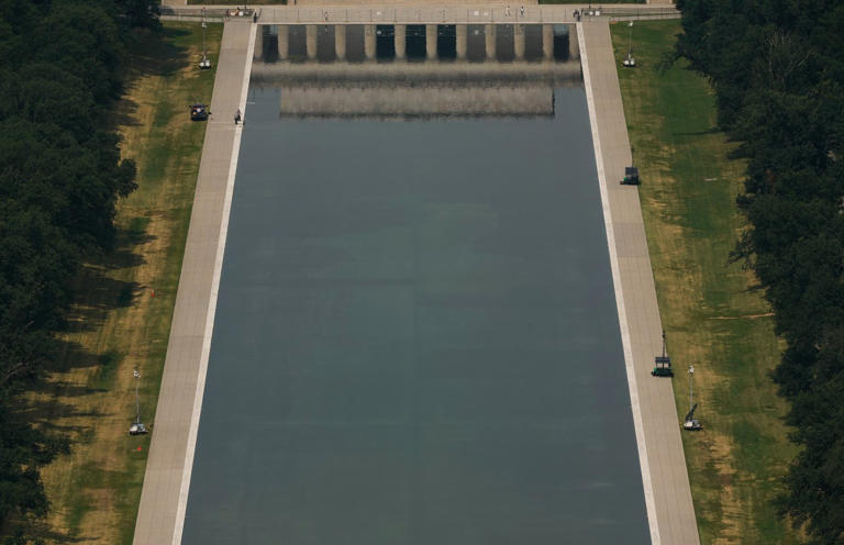A reflecting pool that has long enticed visitors now gains police ...