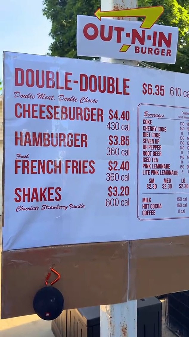The Out-N-In sign created by Lewis, a comedic twist on the classic In-N-Out experience