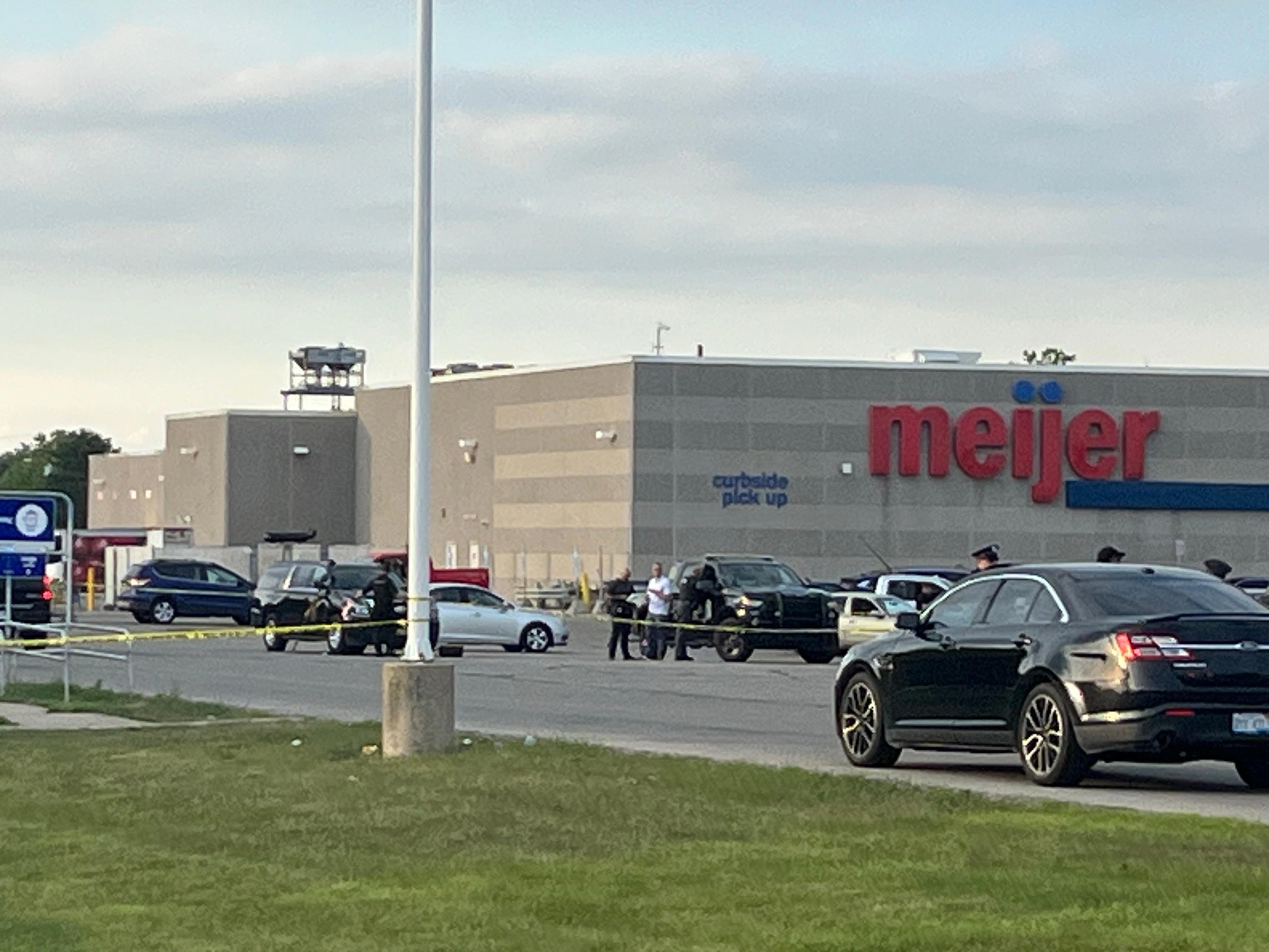 Woman with man shot by police at Southgate Meijer released