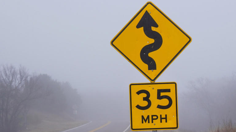 Why do some road signs show a speed limit with an arrow on top?