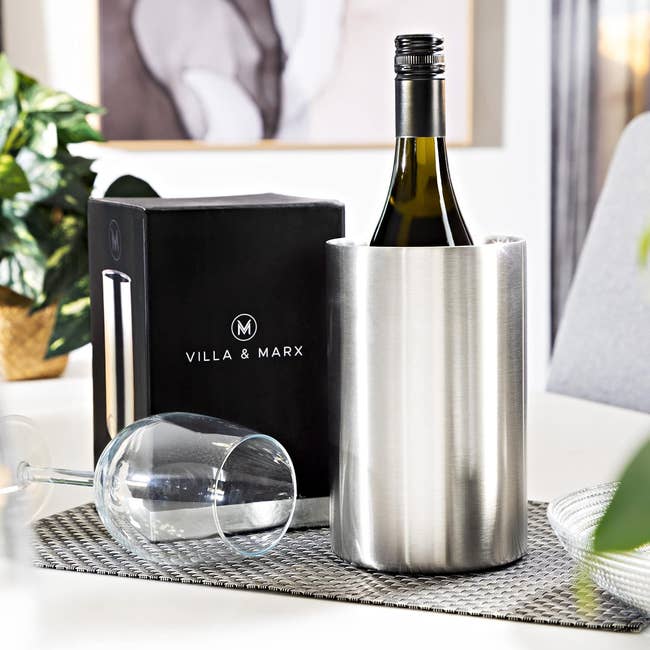 Villa & Marx wine chiller set with a bottle, wine glass, and box displayed on a table, ideal for home entertaining and gift shopping