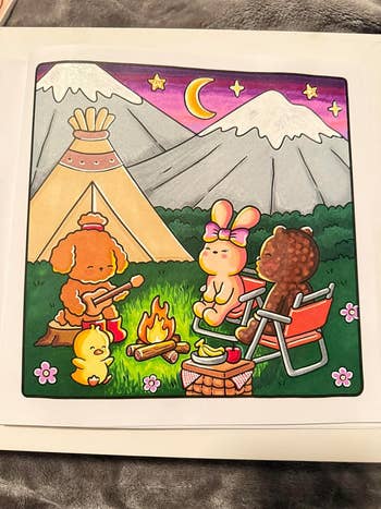 Cartoon animals camping: dog plays guitar, bunny and bear relax by a fire, with a duckling nearby, set in a mountain scene with a moon and stars