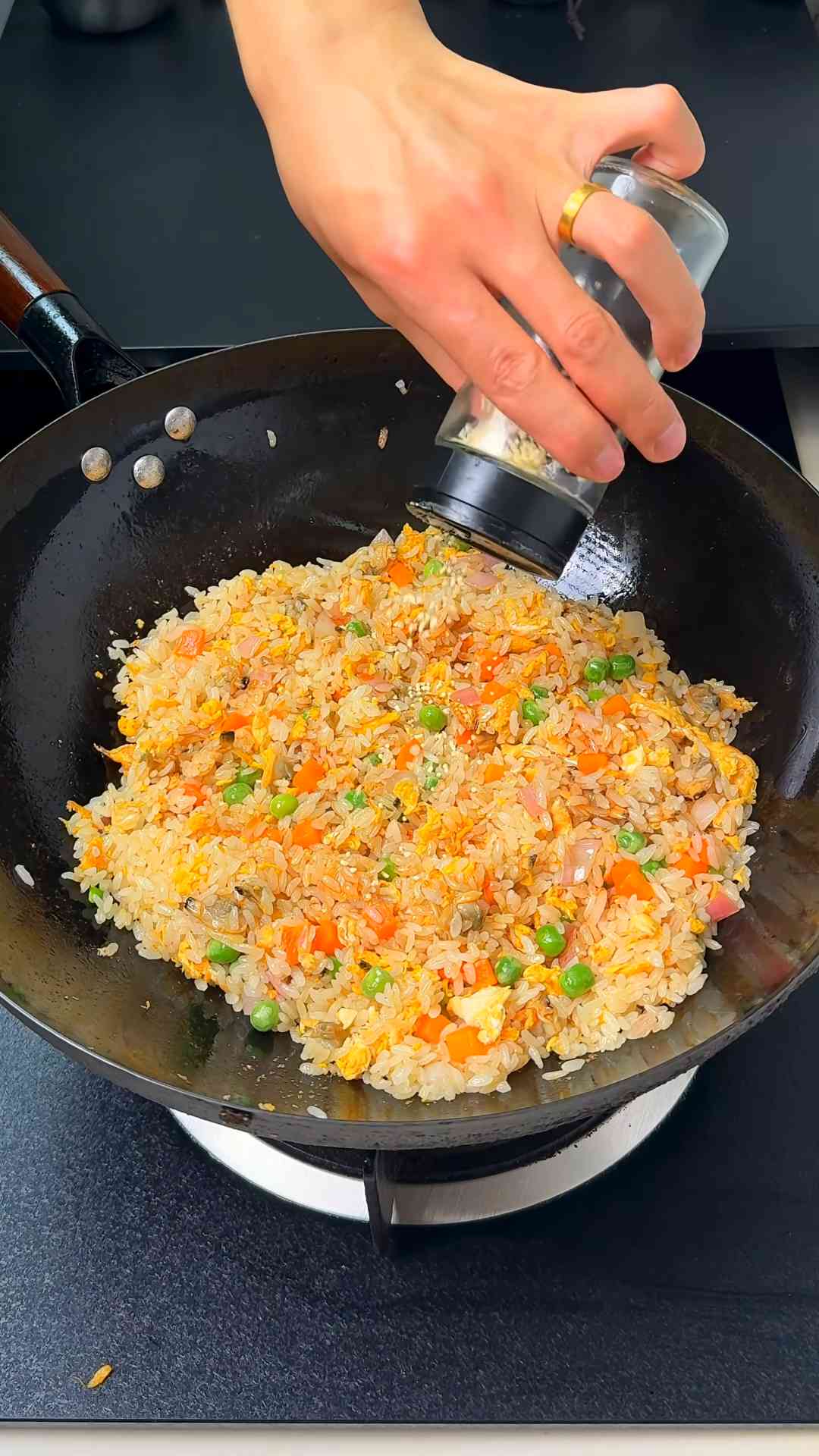 Wok-cooked fried rice with seven eggs and fire