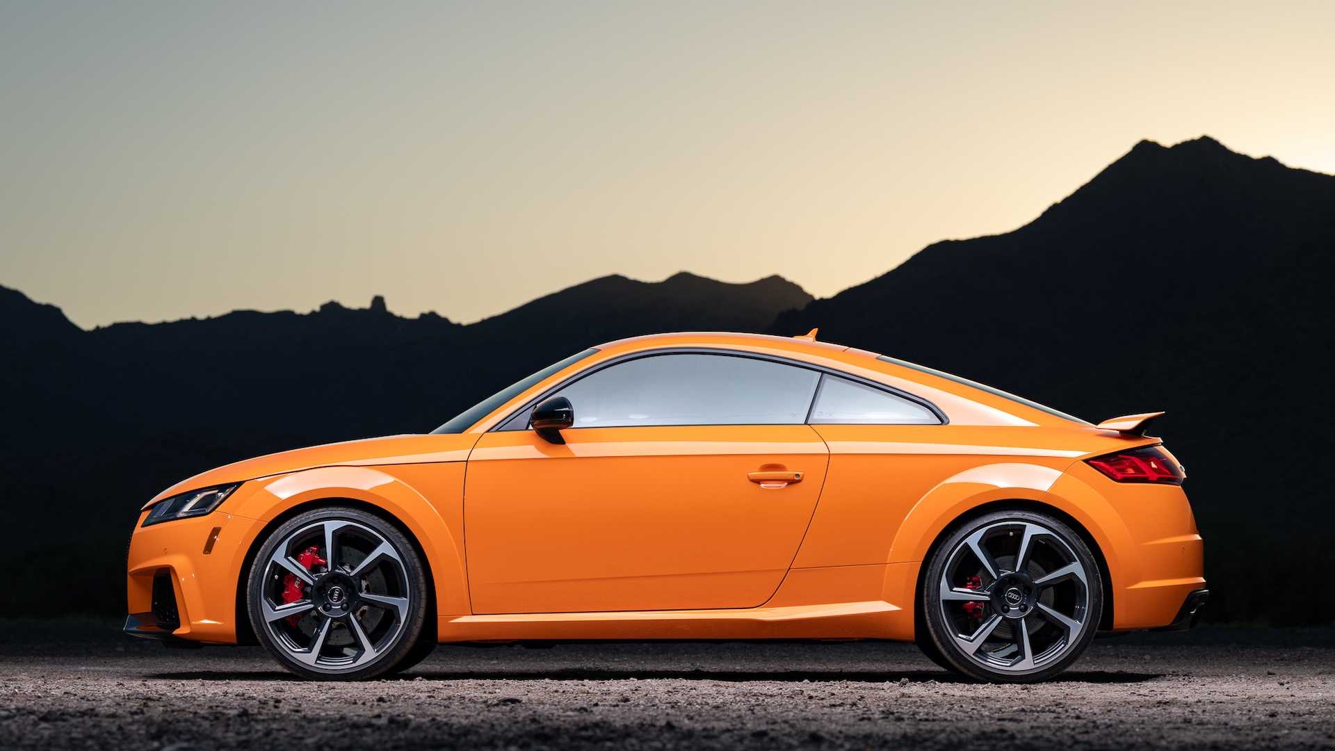 Silhouette of an orange Audi sports car