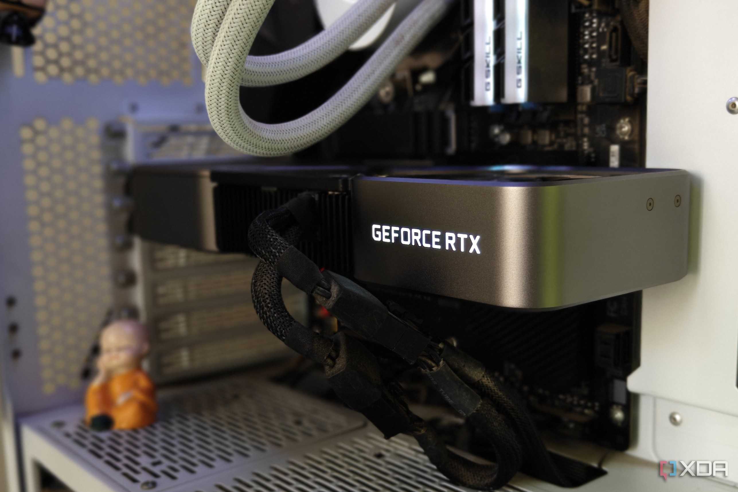 A close-up of an Nvidia graphics card in a white gaming PC