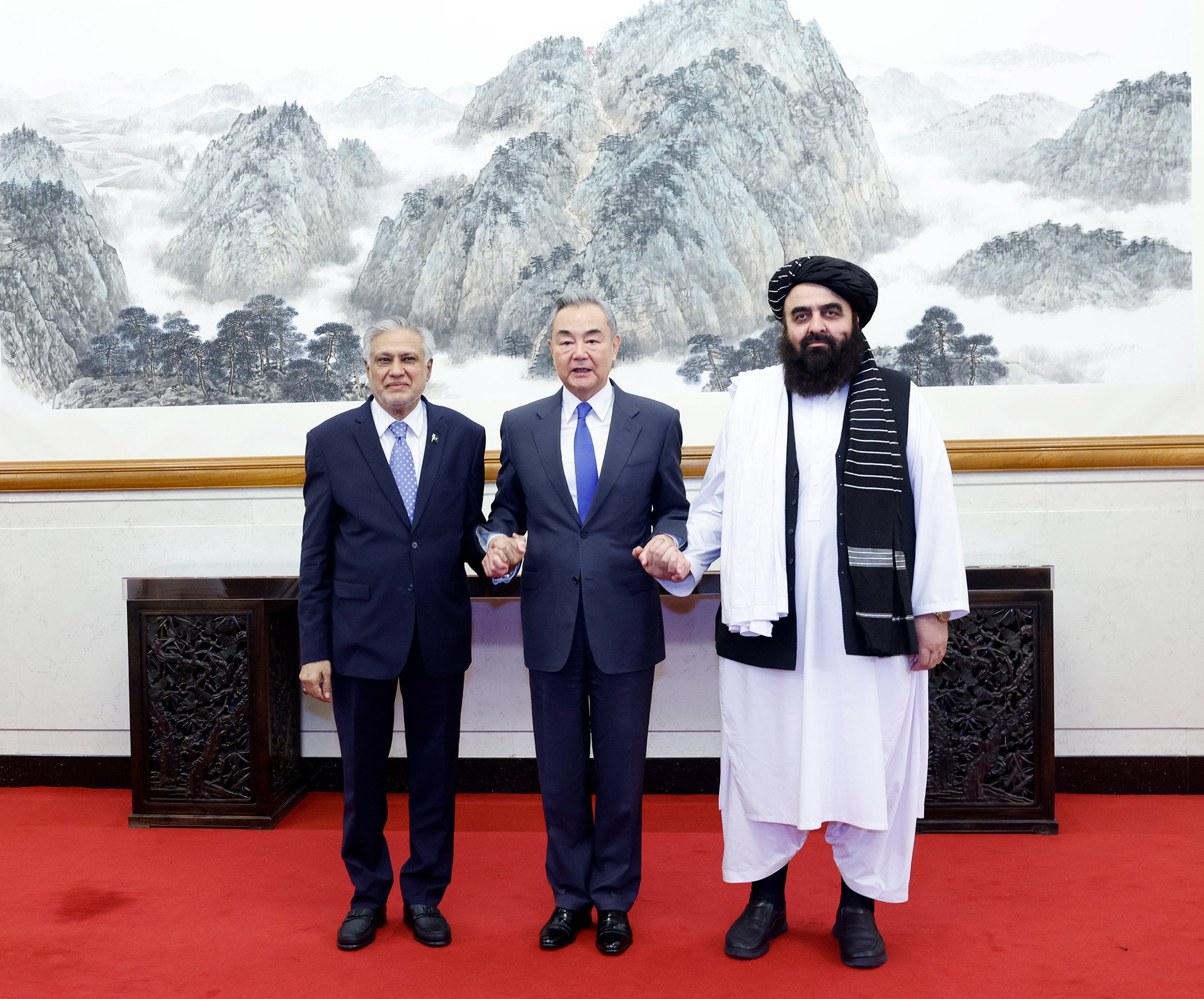 Chinese foreign minister Wang Yi with Pakistani counterpart Ishaq Dar and Taliban’s foreign affairs minister Amir Khan Muttaqi (X/ SpoxCHN_LinJian)
