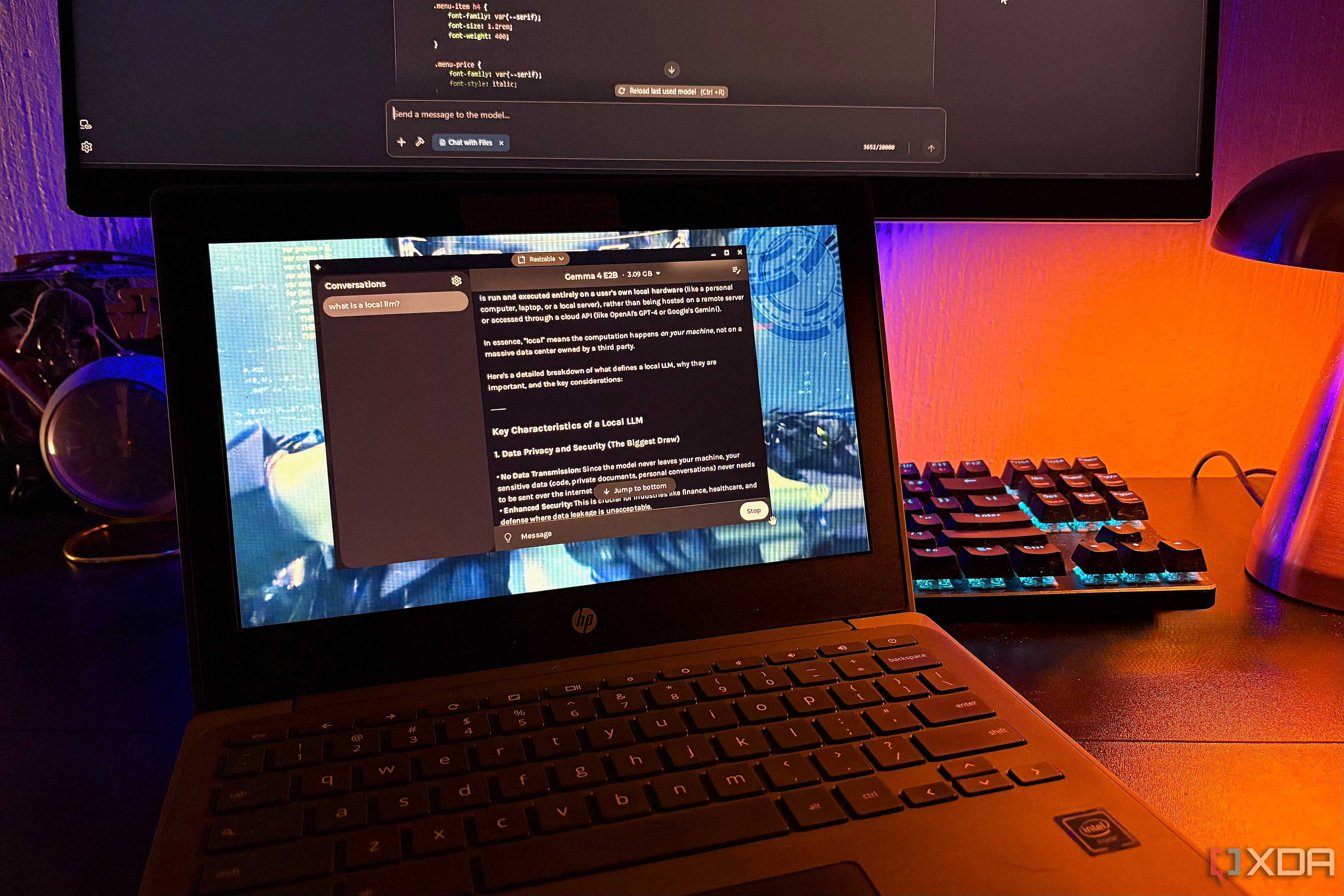 gemma 4 e2b on chromebook, desktop pc and lamp in background