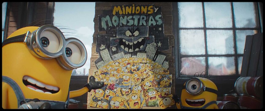 Minions looking at a poster in Minions & Monsters (2026).