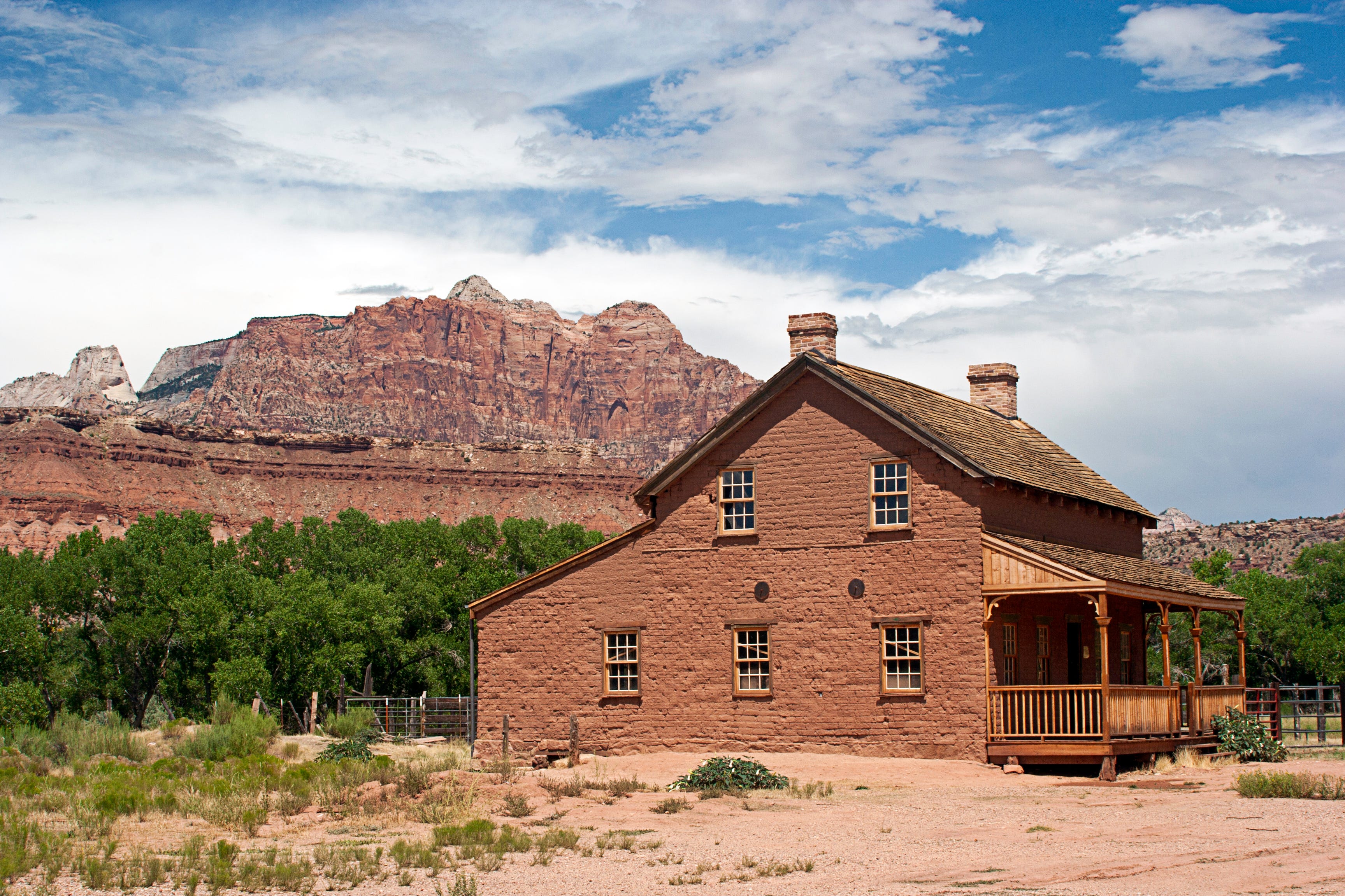 homestead from the 1850's in the Ghost Town of Grafton, Utah with buttes in background