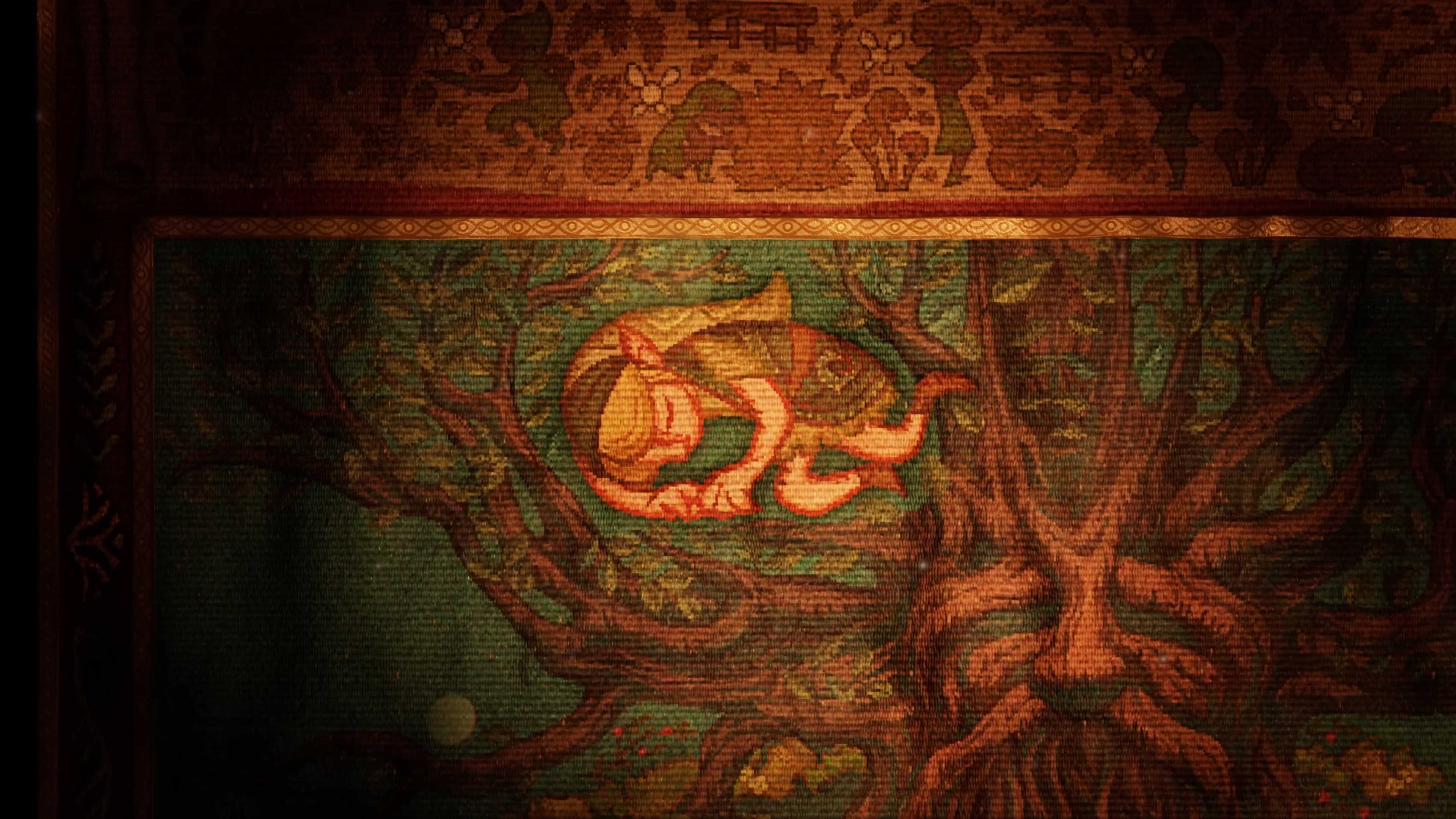 Link asleep on the Ocarina trailer tapestry.