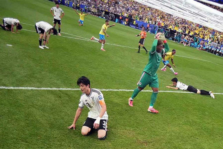 敗れたサッカー日本代表【写真：ロイター】