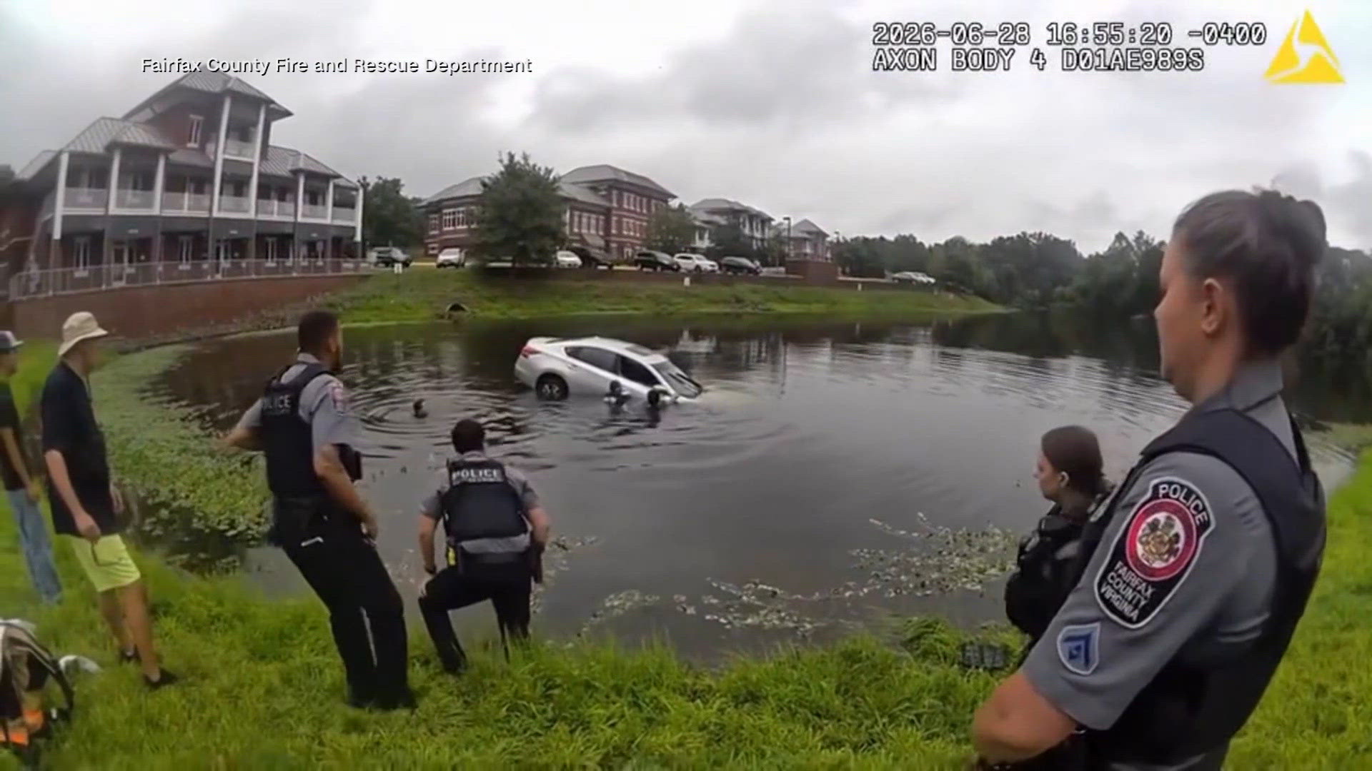 Fairfax County law enforcement rescue driver in pond with human chain