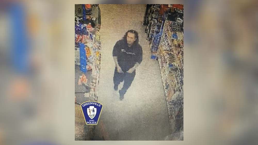 Police looking for man accused of stealing purse at Family Dollar