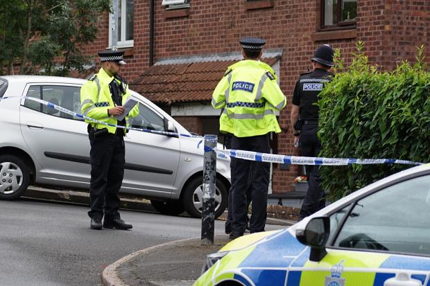 Man charged with double murder after two bodies found at address