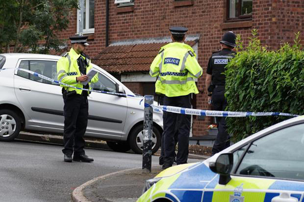 Man charged with double murder after two bodies found at address