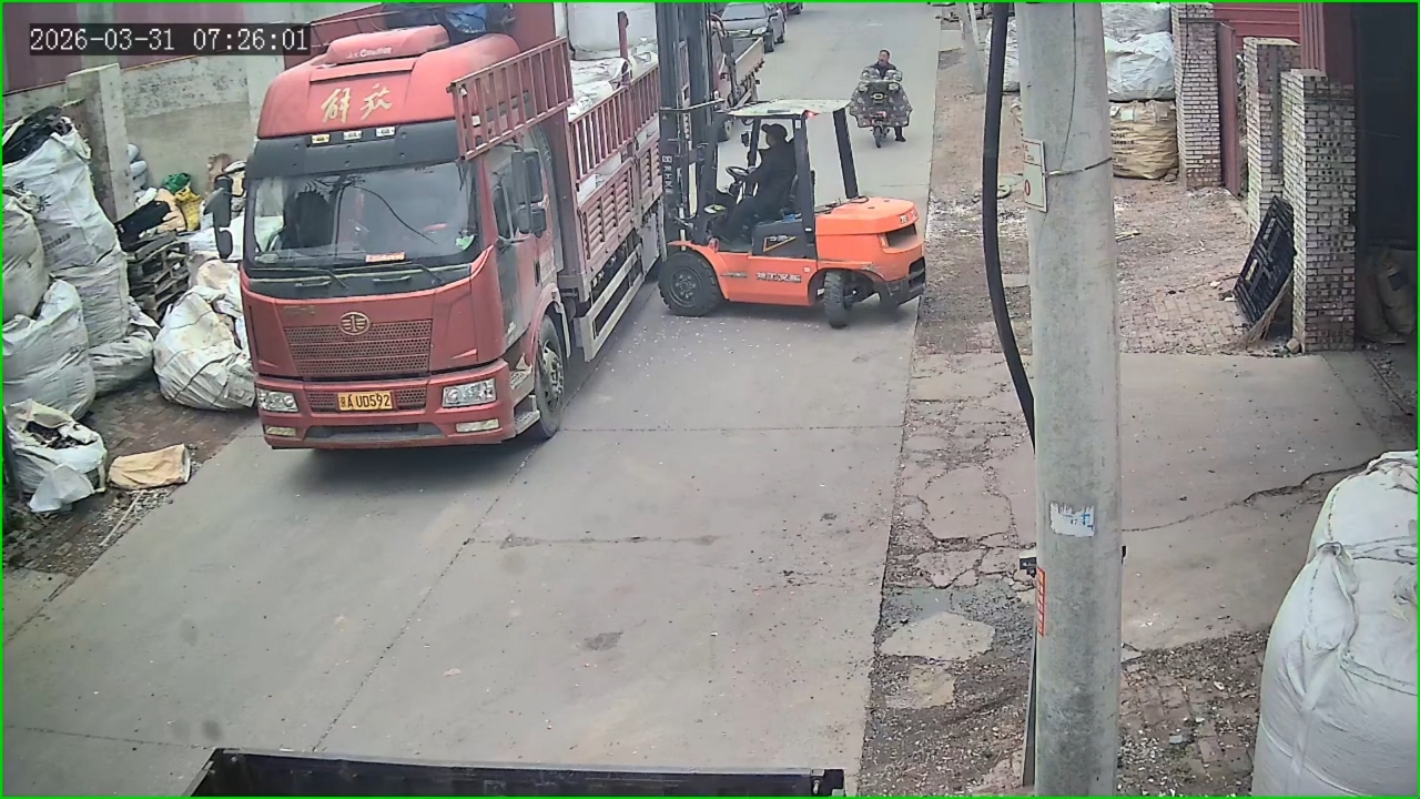 Forklift tips over while unloading container in China