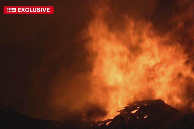 Two men killed, another fighting for life after suspected DV fire