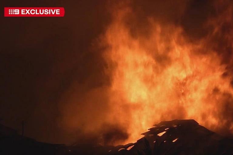 Two men killed, another fighting for life after suspected DV fire