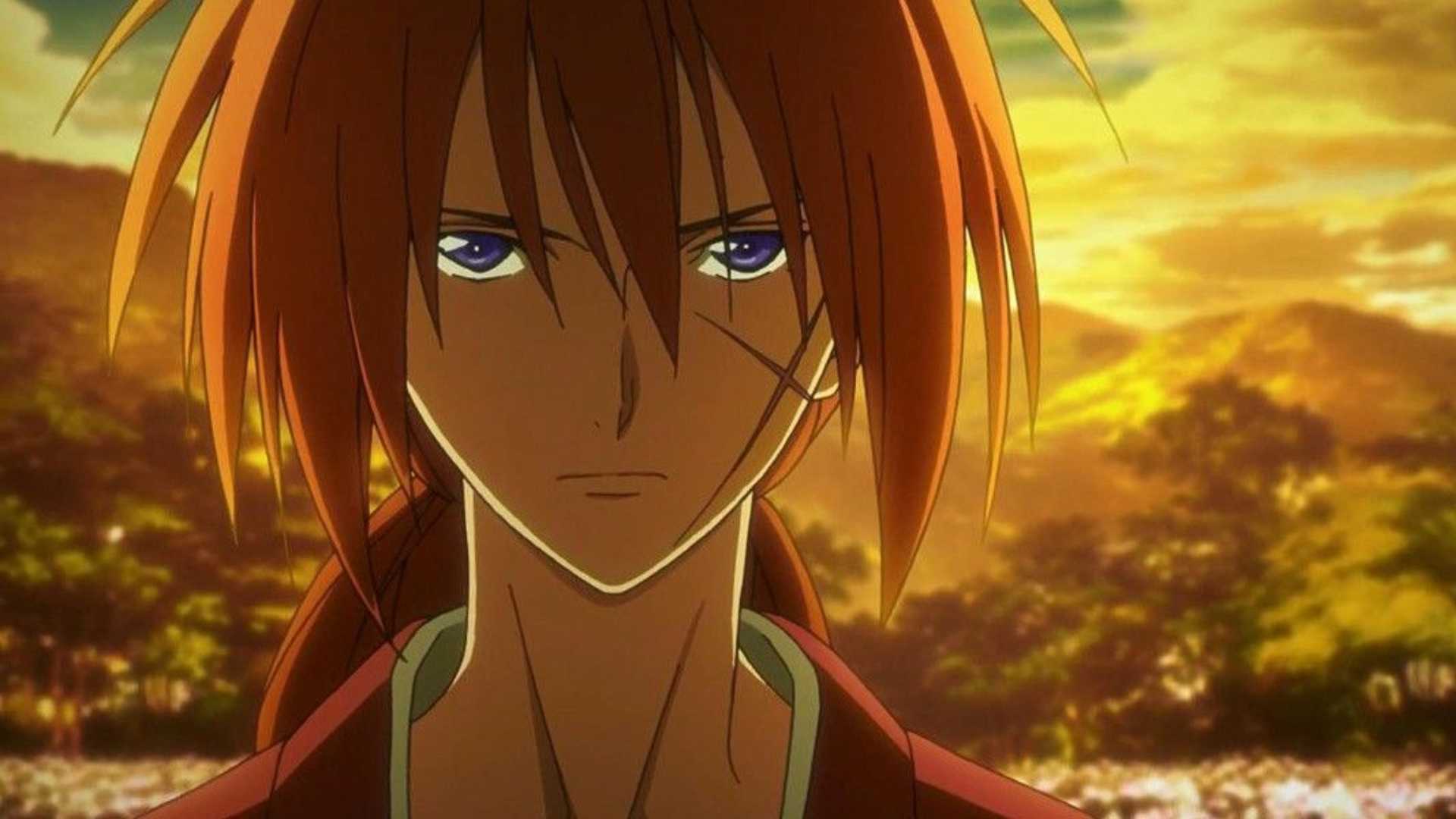Kenshin Himura standing in front of a sunset in Rurouni Kenshin anime
