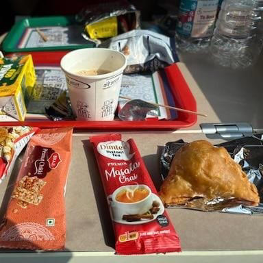 Expect hygienically packed meals: Vande Bharat serves branded, ready-to-eat (RTE) meals that are packed for hygiene and convenience. Menus may vary slightly depending on the train’s route and journey timing.