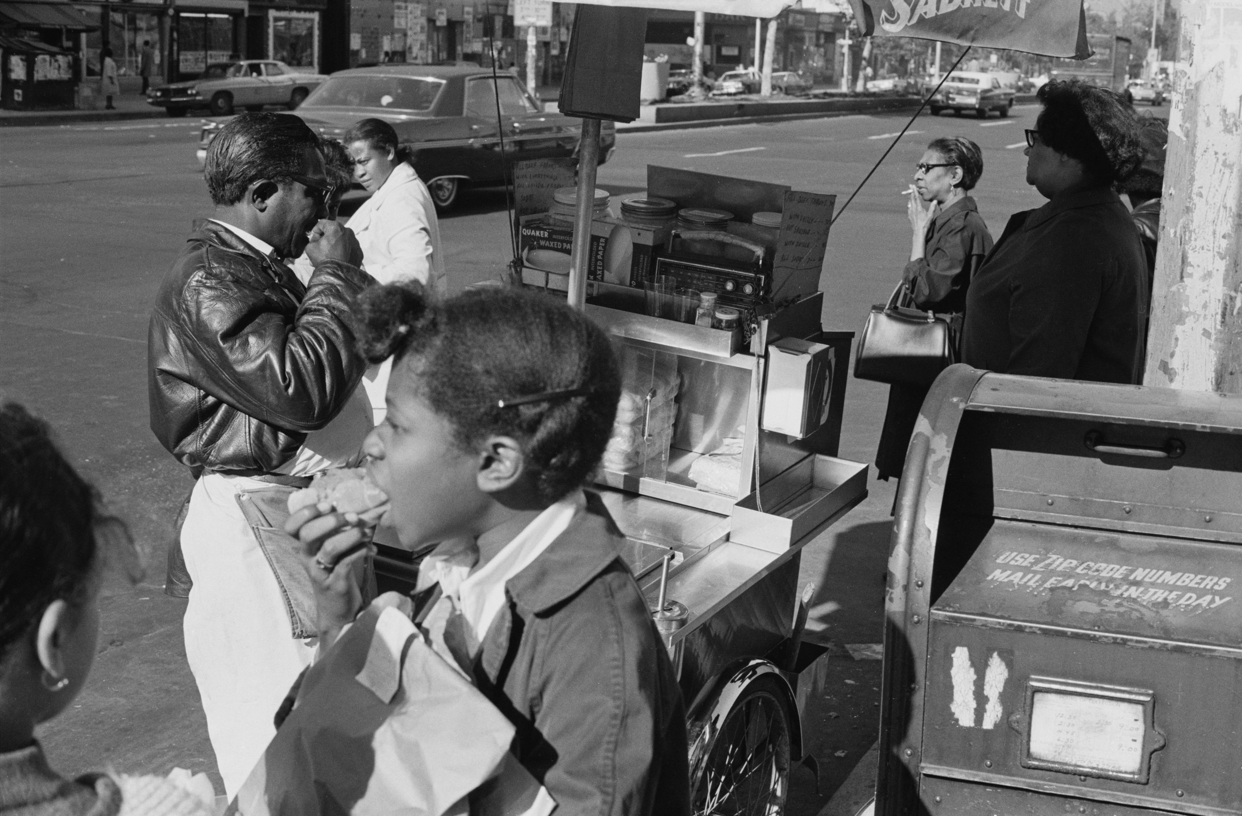 A hot dog stand in Harlem, New York City, circa 1968.