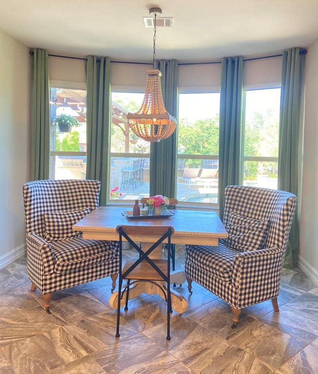 another reviewer's grass green curtain panels in a dining room setting