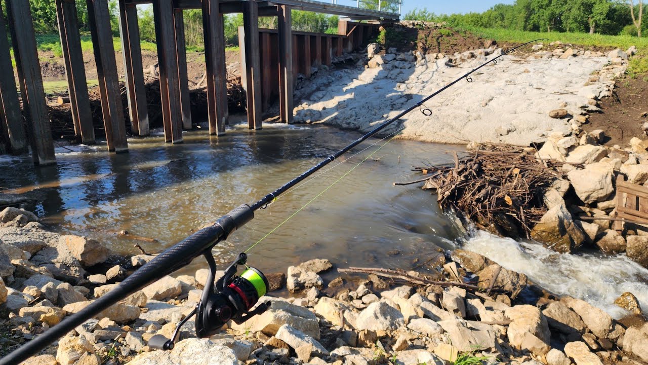 Exploring a small stream spillway for catfish!