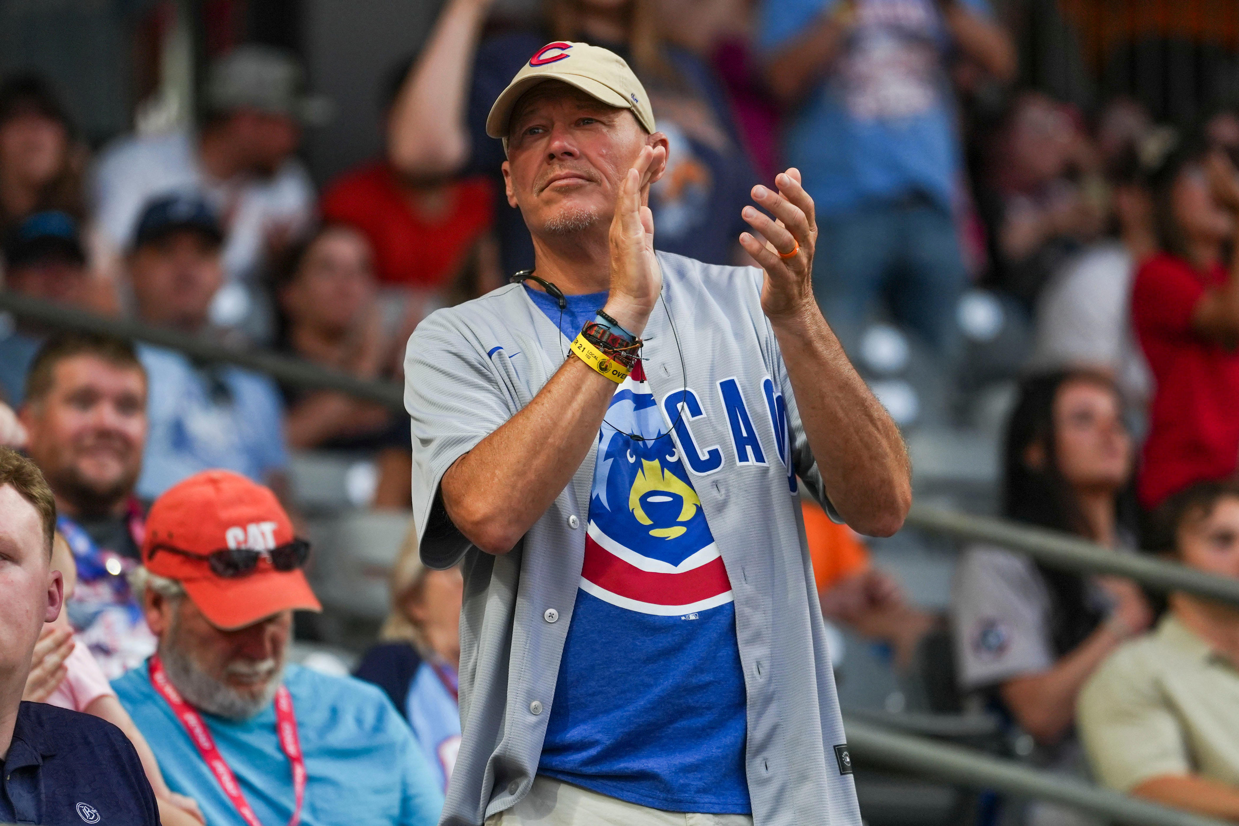 A Smokies fans claps during a minor league baseball game between the Knoxville Smokies and Chattanooga Lookouts at Covenant Health Park in Knoxville, Tenn., on June 20, 2026.