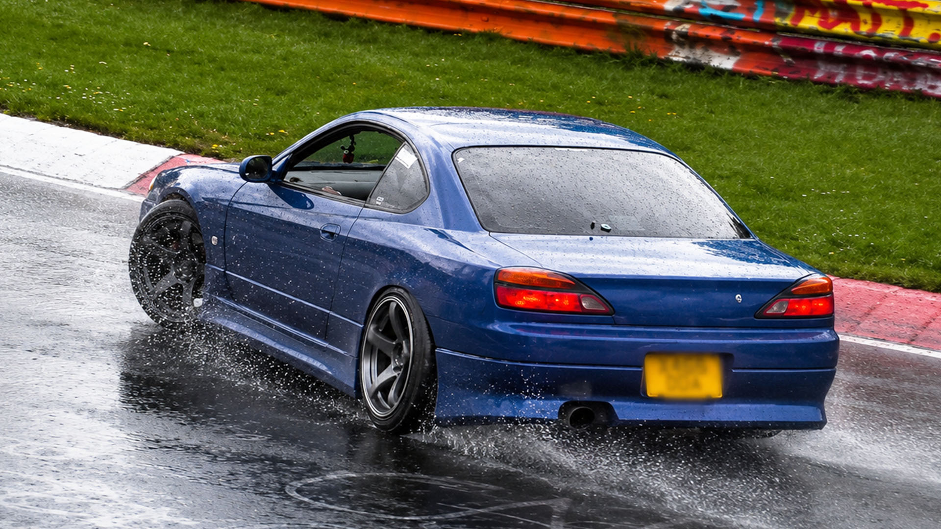 Wet Nordschleife pushes driver closer to a costly mistake