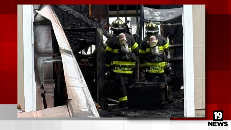 Parma fire crews extinguish garage fire that spread to nearby home
