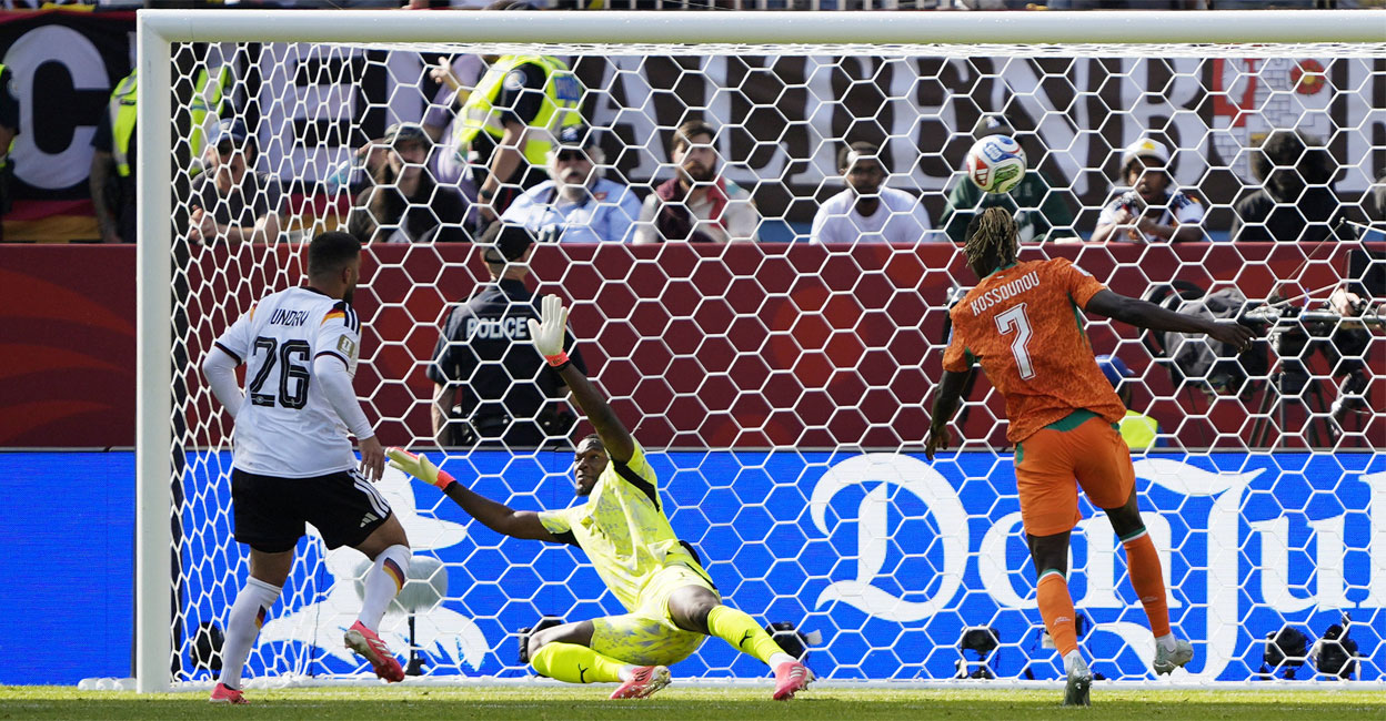 Germany rally past Ivory Coast to reach World Cup knockout stage