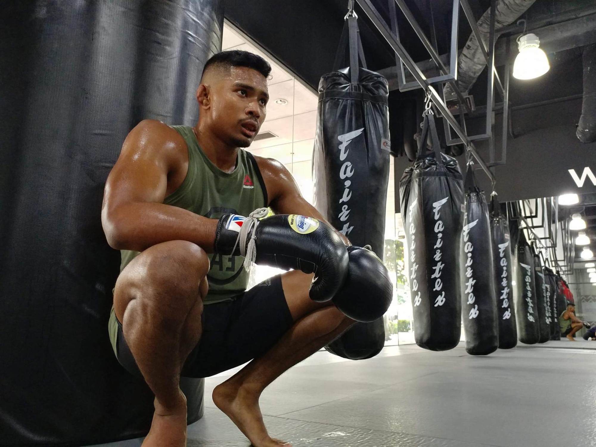 Former mixed martial arts fighter Amir Khan, who has struggled with processing his emotions following the death of his father, now seeks to help others improve their physical and mental health. Photo: Amir Khan
