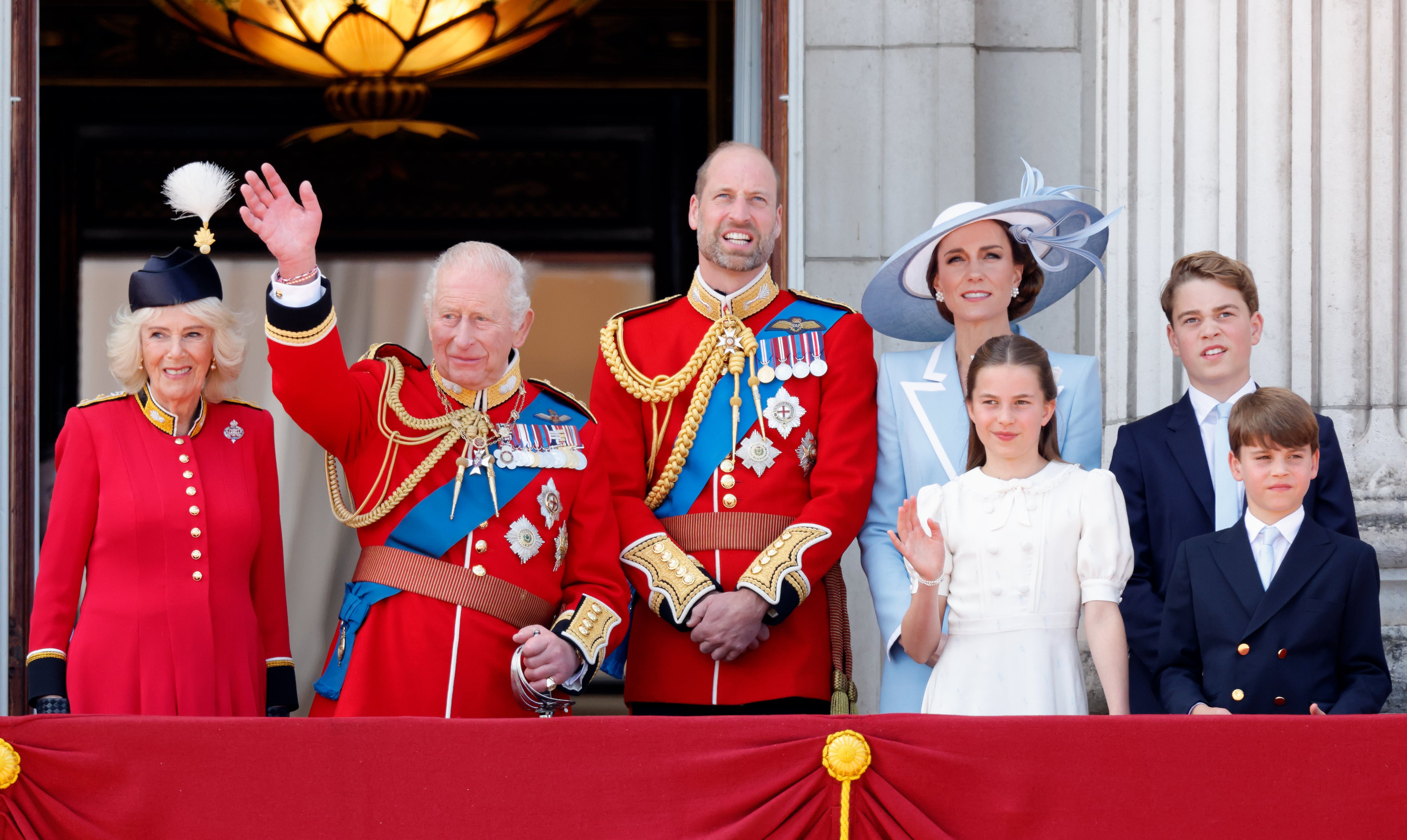 The royal family presents a united front on the balcony of Buckingham Palace at the Trooping of the Colour, but King Charles and Prince William do not see eye to eye on Harry. / Max Mumby/Indigo / Getty Images