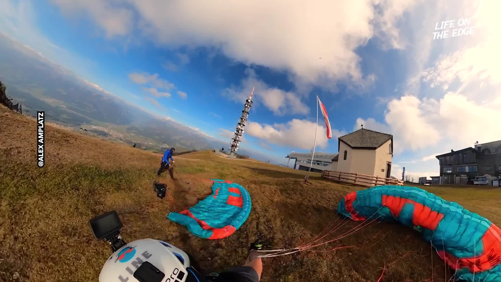 Speedflying pilot races down mountain at extreme speed