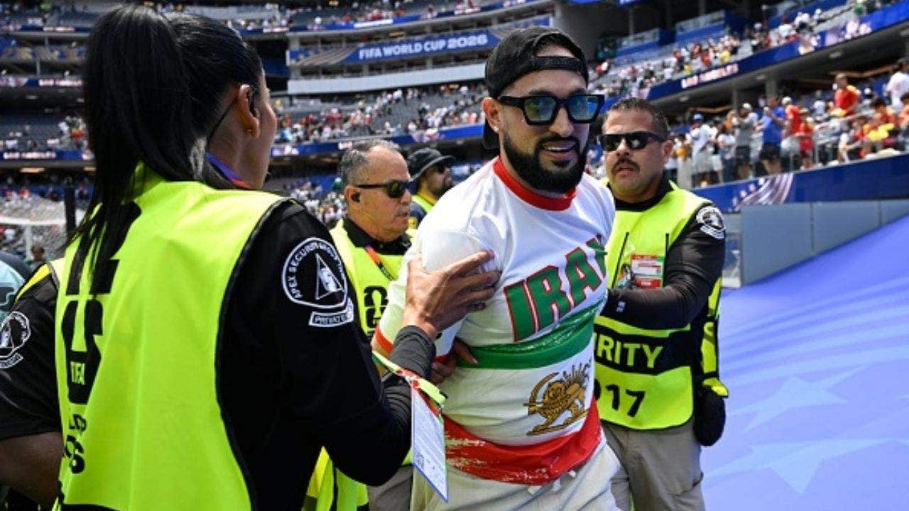 Iran supporter detained by security during Belgium-Iran FIFA World Cup 2026 Group G match at SoFi Stadium, Los Angeles. ( Photo by Nico Vereecken / Photo News via Getty Images) Getty Images