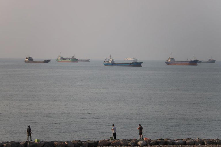 Vessels in the Strait of Hormuz near the beach of Bandar Abbas, Iran, June 21, 2026. Amirhosein Khorgooi/ISNA/via WANA (West Asia News Agency)via REUTERS