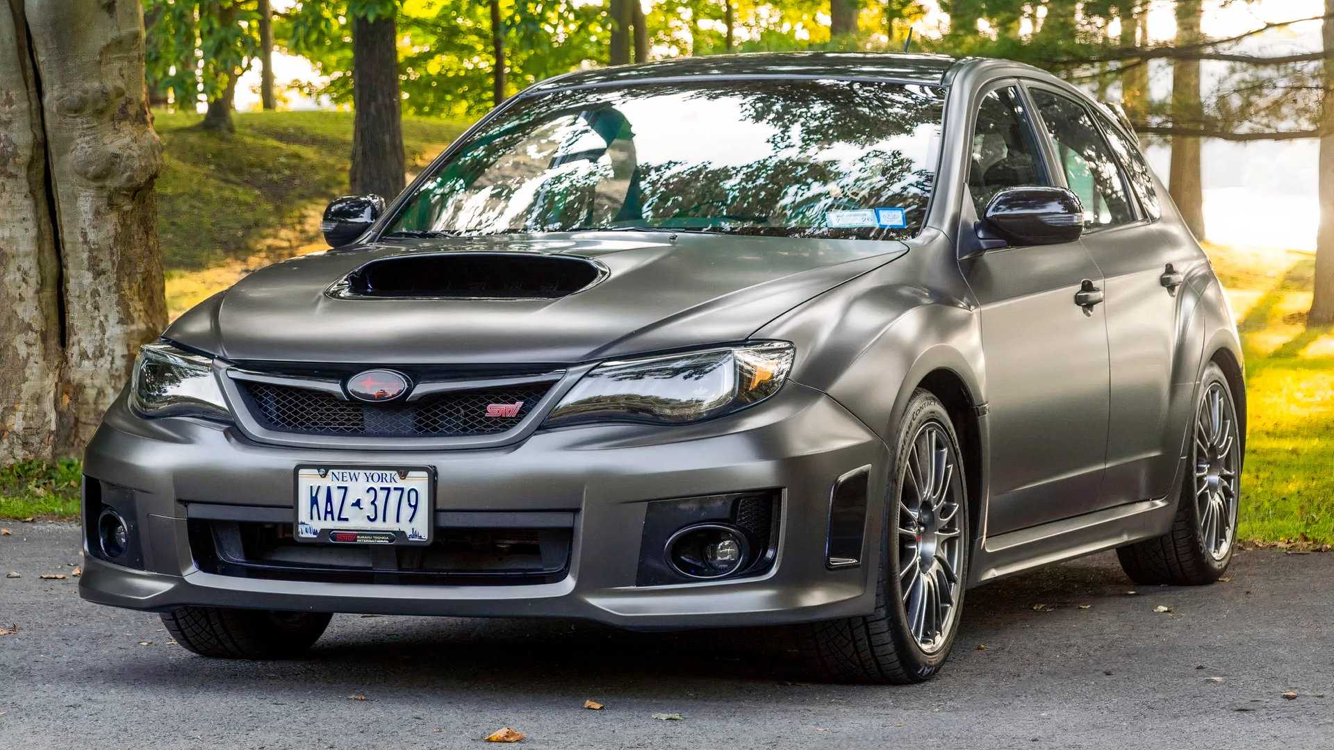 2012 Subaru Impreza WRX STi front 3/4 shot parked on the road