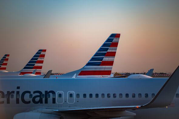 American Airlines tails and fuselage at sunrise at Dallas Fort Worth International Airport in Oct 2024