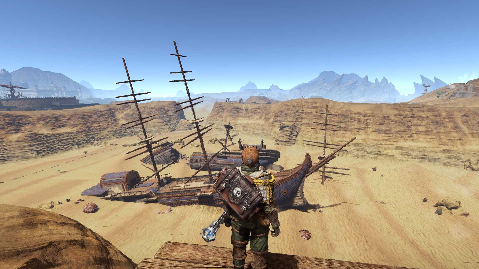 Adventurer in Outward Looking at the Abandoned Ships in the Desert
