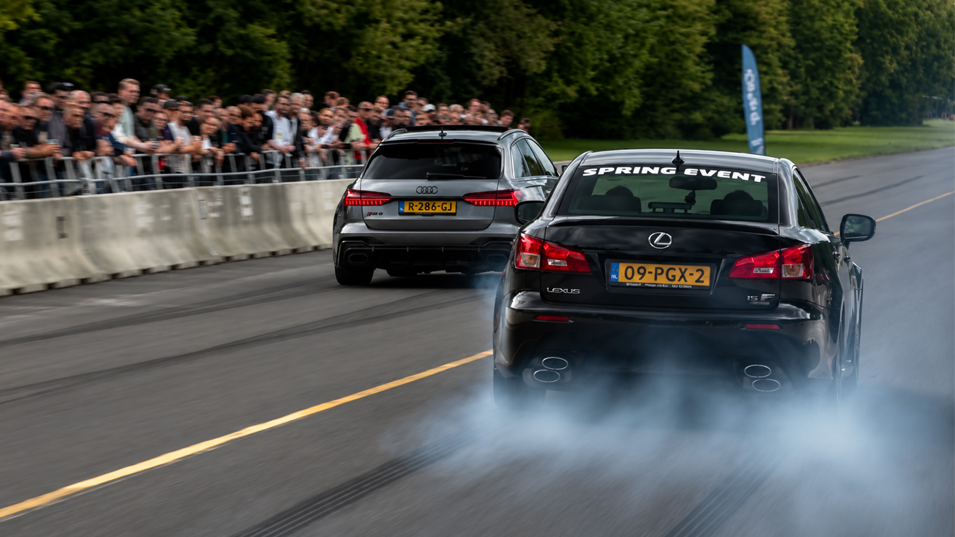 Lexus IS F nearly loses control during drag race with Audi RS6