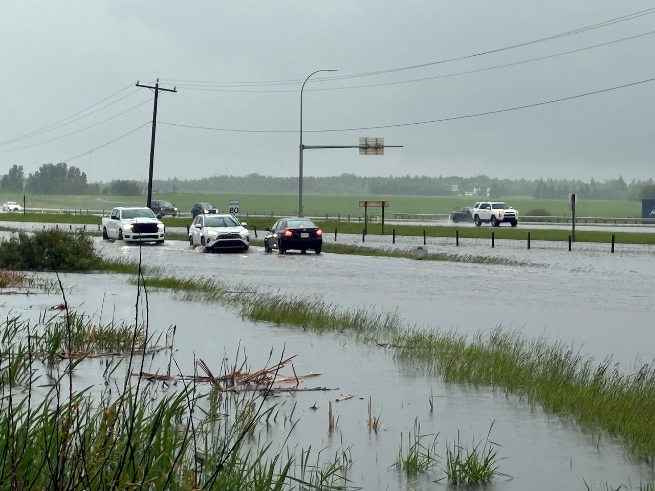 Deluge of rain leads to flooding, water restrictions in Edmonton and area