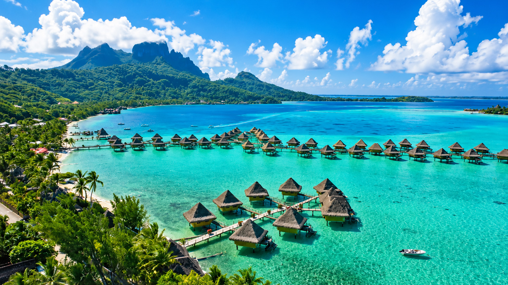 Overwater villas floating above unreal blue tropical waters
